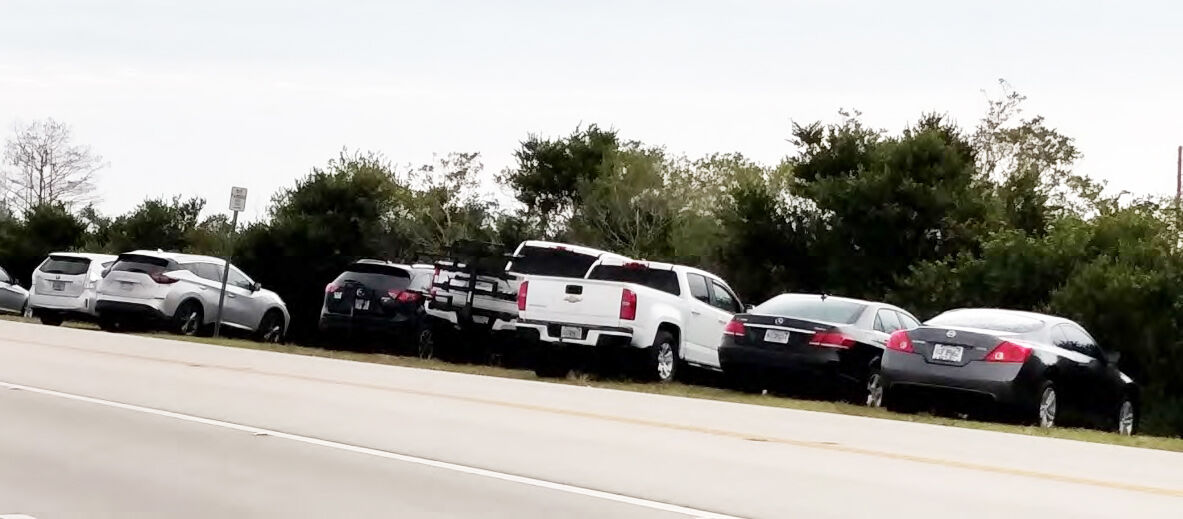 This Park Service image shows cars parked along the Tamiami Trail after parking at Shark Valley was full on a recent weekend.